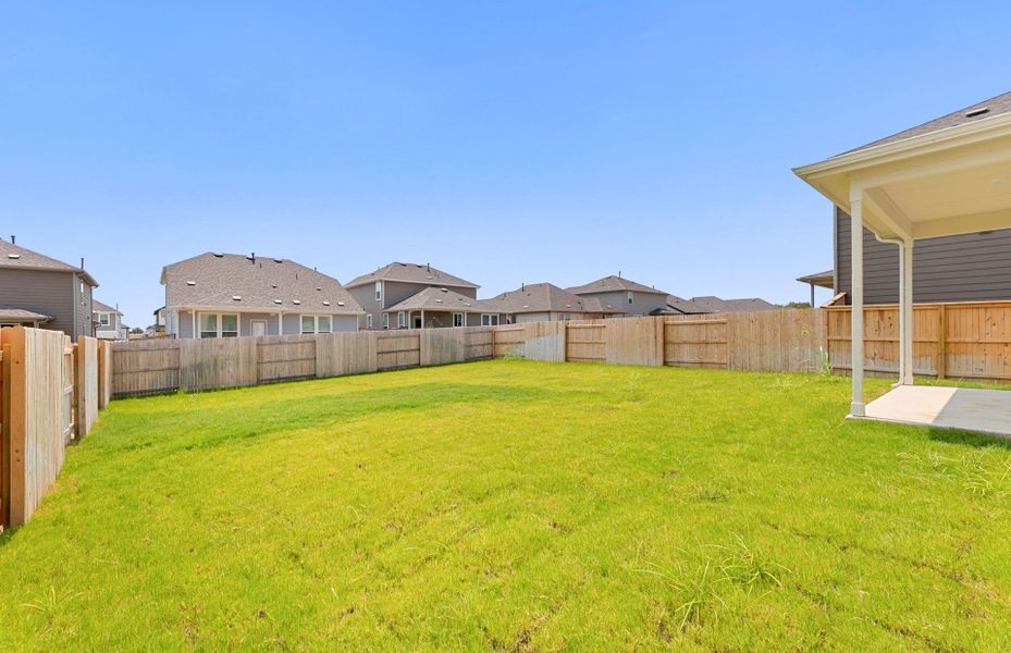 Exterior details and patio area of a home in Patterson Ranch, Georgetown (Image 26).