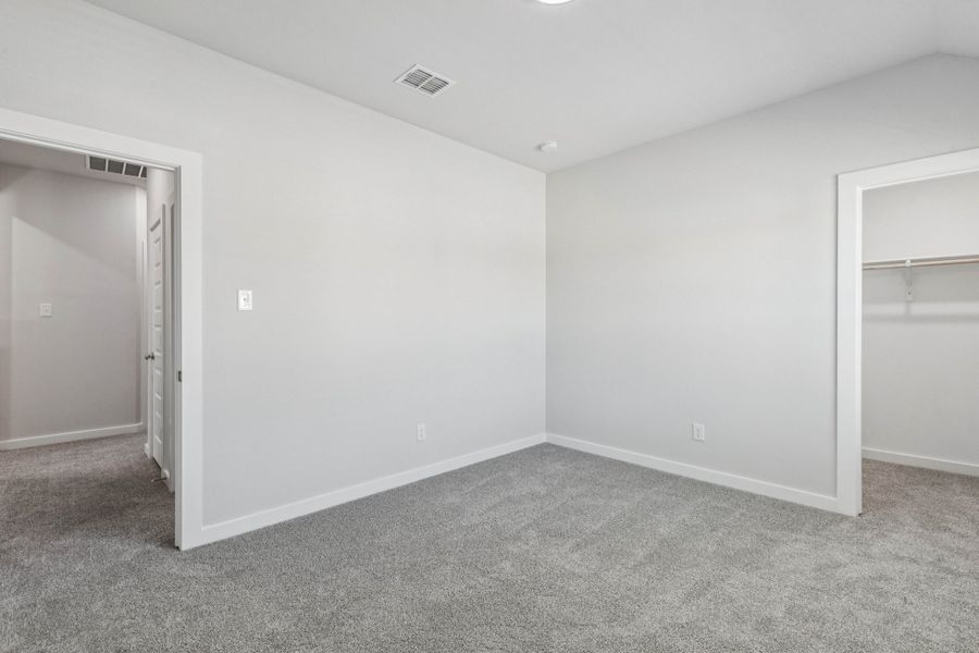 Bedroom in the Winters home plan by Trophy Signature Homes – REPRESENTATIVE PHOTO