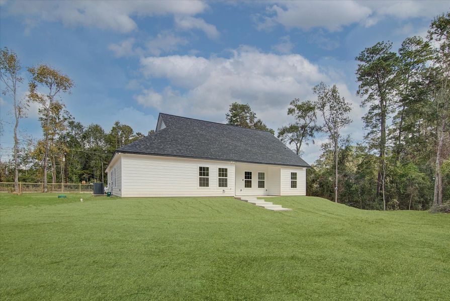 Front exterior of a new home in , Cleveland, TX, highlighting curb appeal (Image 23). Front exterior of a new home in , Cleveland, TX, highlighting curb appeal (Image 23).