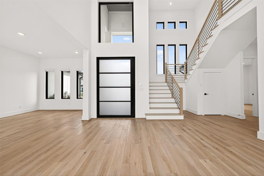 Entrance: Inside, you’ll find luxurious finishes, soaring ceilings, and an open-concept layout filled with natural light. The home includes a home office, spacious game room, private media room, and designer living spaces that seamlessly blend elegance with comfort. Step outside to your own backyard retreat featuring a luxury pool, creating the ultimate space for relaxation and entertaining year-round.