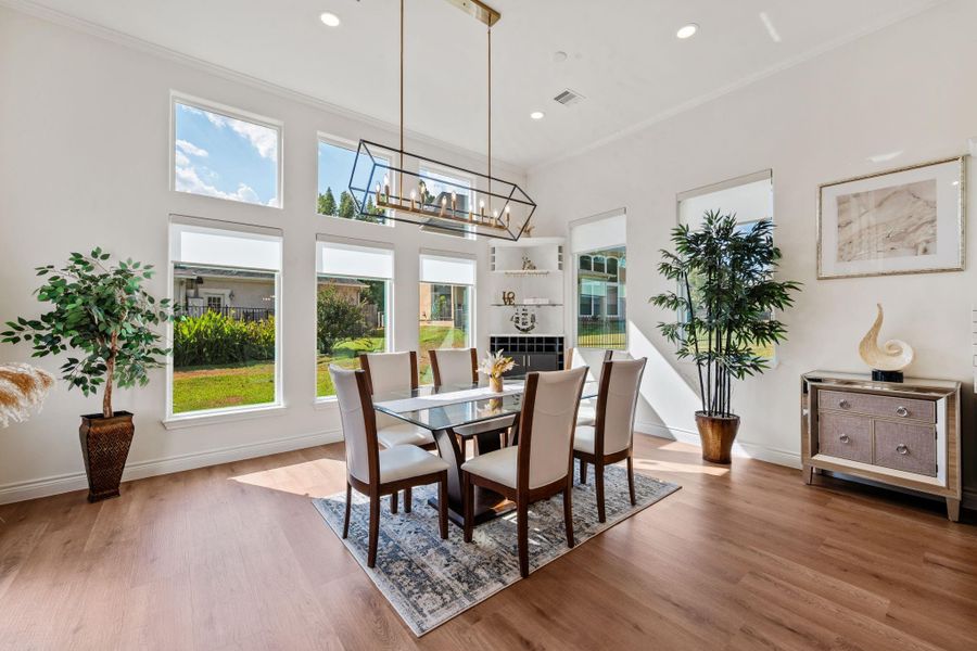 The expansive dining area offers a generous footprint, that can easily accommodate a large dining table.