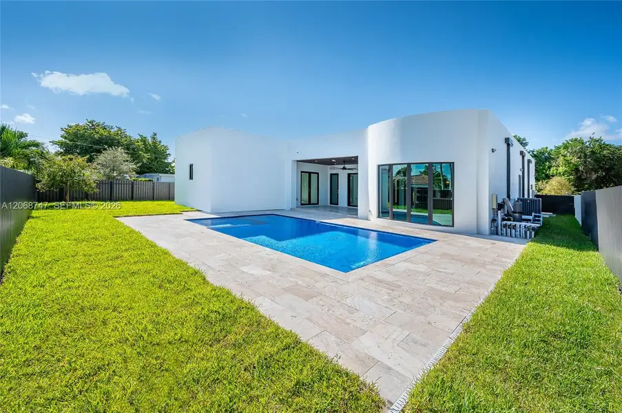 Exterior details and patio area of a home in , Miami (Image 2). Exterior details and patio area of a home in , Miami (Image 2).