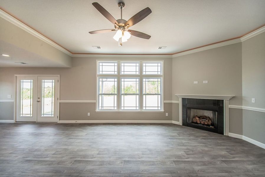 Representative unfurnished interior of a home built from the Beaumont by Enchanted Homes in Guadalupe Heights, Seguin (Image 47).