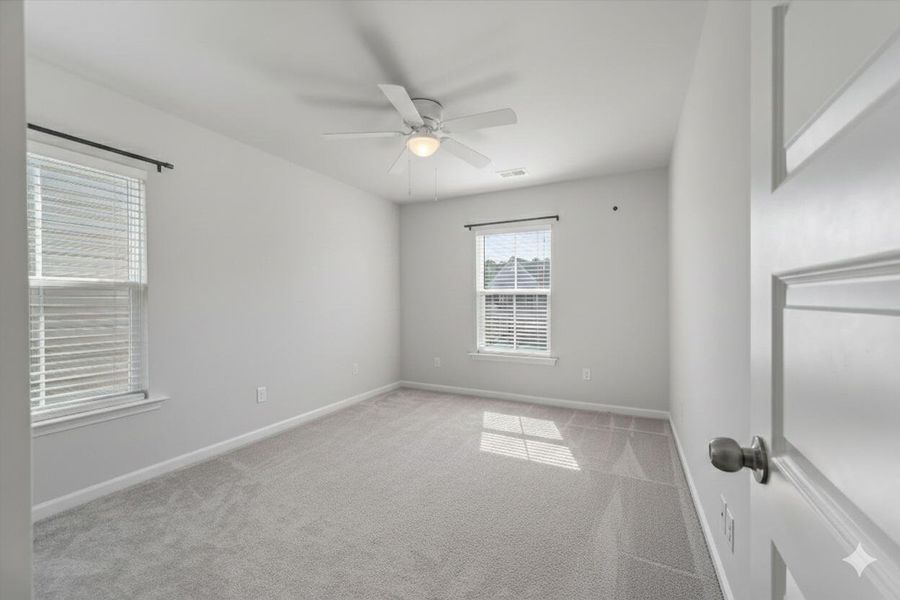 Spacious, unfurnished interior of a new home in Sweetgrass at Summers Corner, Summerville (Image 54).