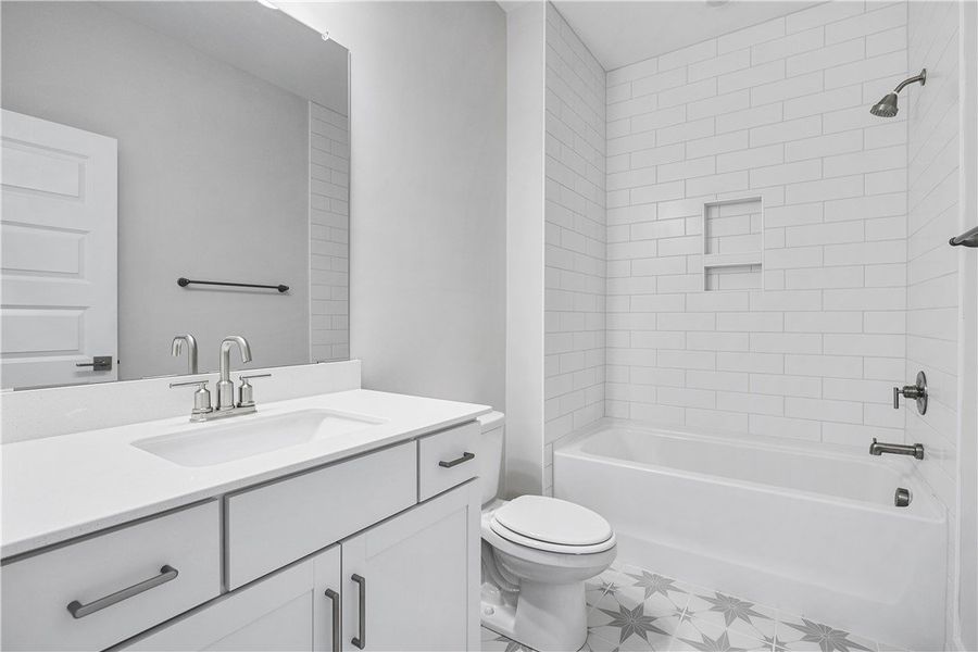A well-appointed bathroom with a spacious vanity a