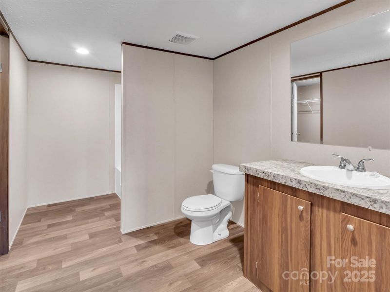 Furnished interior view inside a new home in , Waynesville (Image 9).