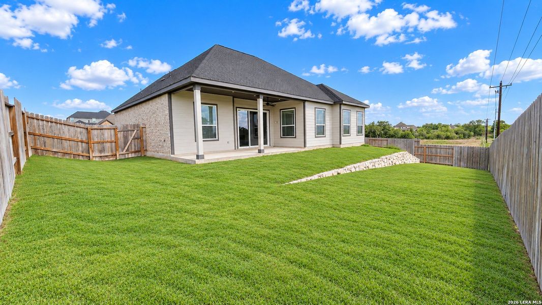 Exterior details and patio area of a home in Potranco West, Castroville (Image 4).