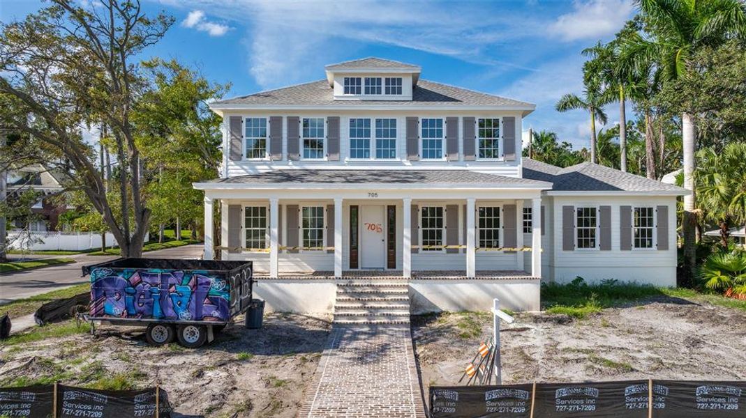 Front exterior of a new home in , St. Petersburg, FL, highlighting curb appeal (Image 28).