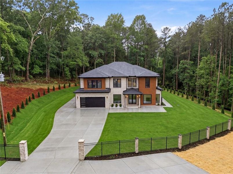 Front exterior of a new home in , Dacula, GA, highlighting curb appeal (Image 2). Front exterior of a new home in , Dacula, GA, highlighting curb appeal (Image 2).