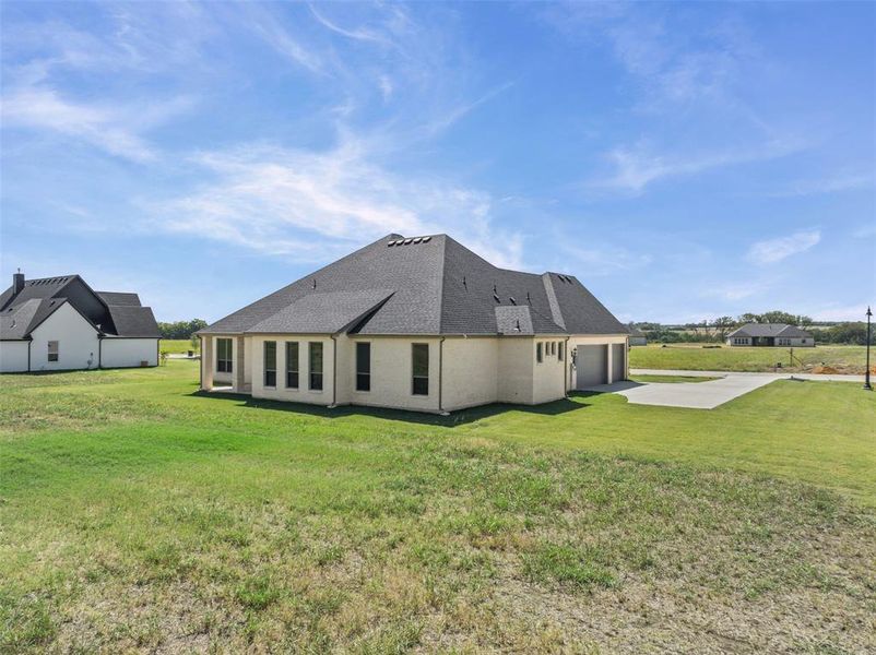 Exterior details and patio area of a home in Waterfall Ranch - 1 Acre Lots, Waxahachie (Image 27). Exterior details and patio area of a home in Waterfall Ranch - 1 Acre Lots, Waxahachie (Image 27).