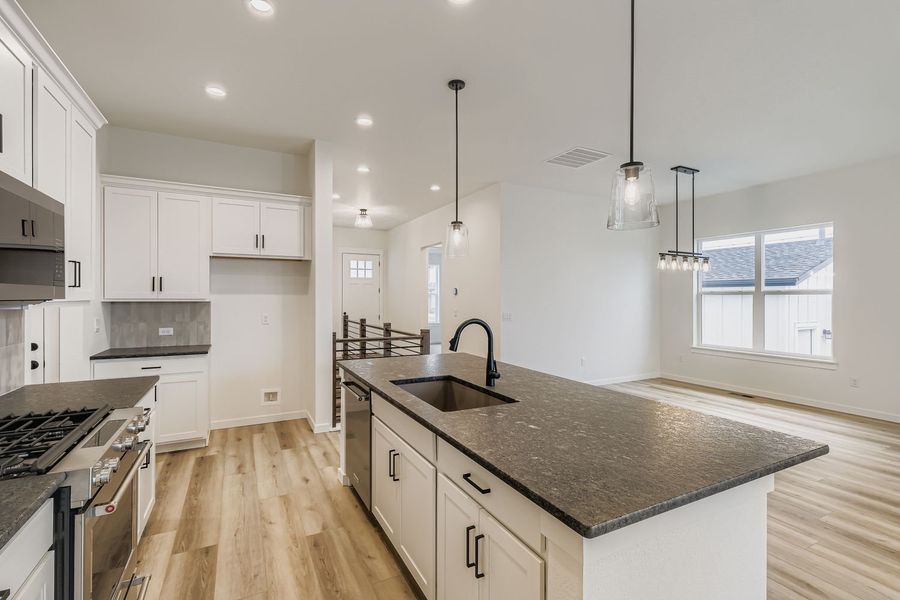 Furnished interior view inside a new home in Sterling Ranch Homestead 50s, Colorado Springs (Image 9).
