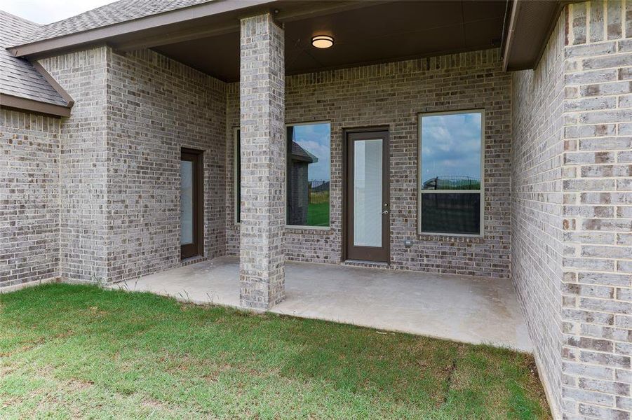 Front exterior of a new home in , Venus, TX, highlighting curb appeal (Image 19).