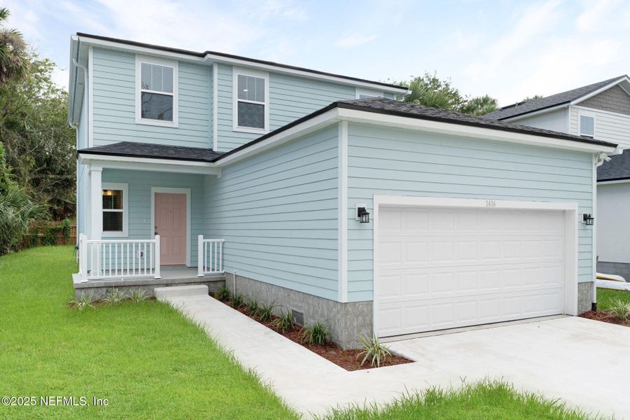 Front exterior of a new home in , Jacksonville, FL, highlighting curb appeal (Image 22).