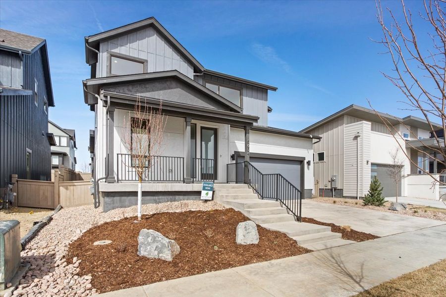 Front exterior of a new home in West Grange, Longmont, CO, highlighting curb appeal (Image 18).