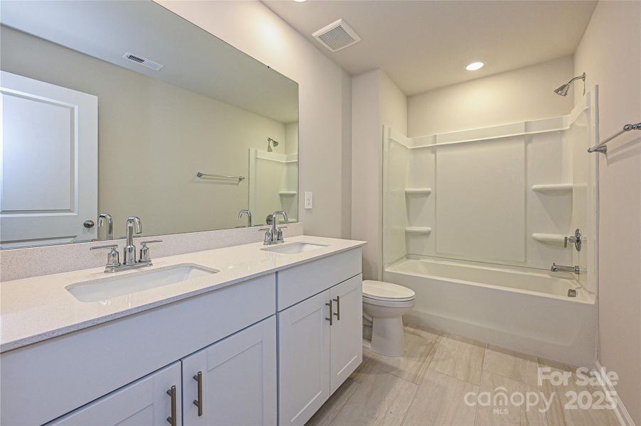 Furnished interior view inside a new home in Harper Landing, Stanley (Image 4).