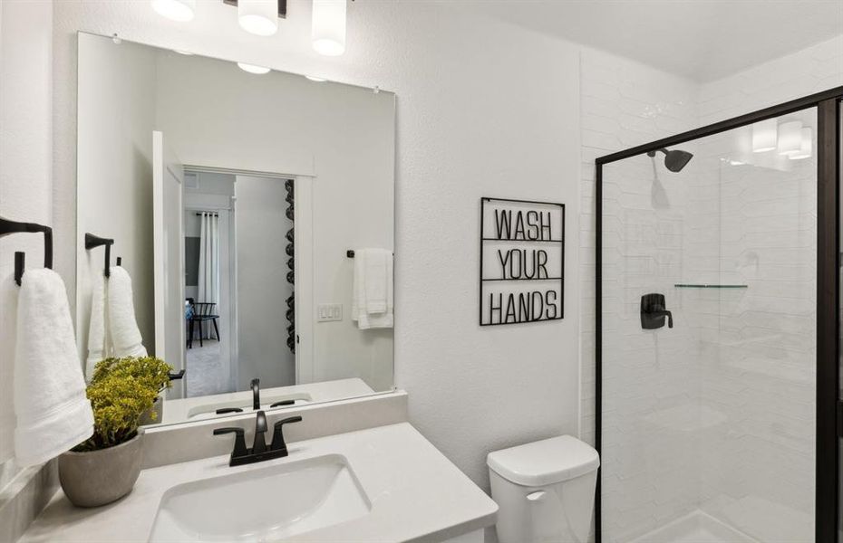 Stylish secondary bath with high-end fixtures *Model representation Stylish secondary bath with high-end fixtures *Model representation