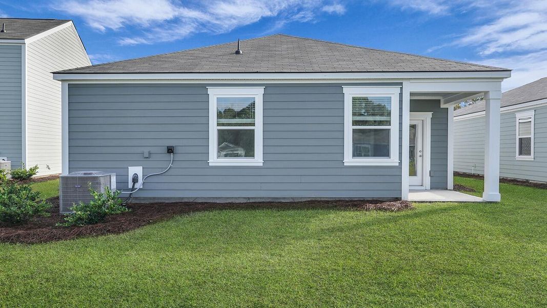 Exterior details and patio area of a home in The Oaks at Center Station, Hollywood (Image 18).