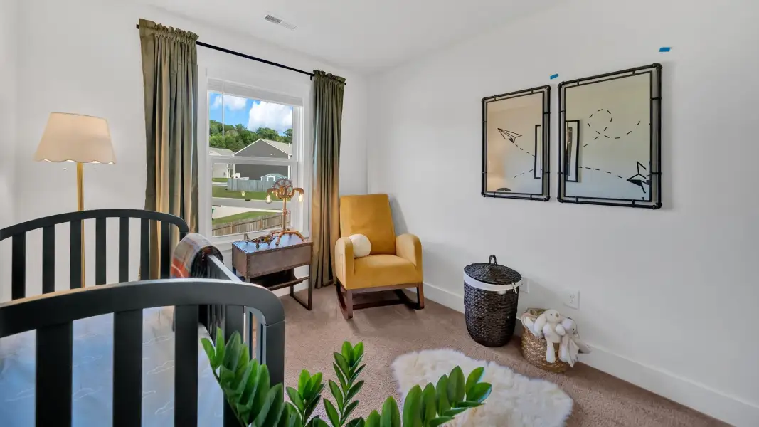 Representative furnished interior of a home built from the Mitchell Townhome by D.R. Horton in Oak Vista, Knoxville (Image 19).
