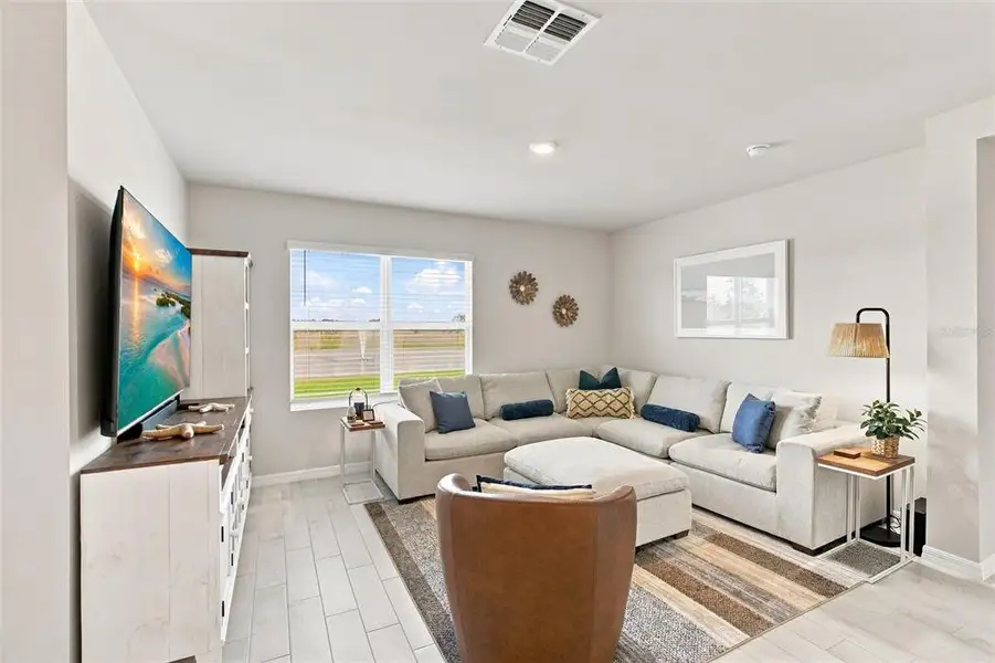 Furnished interior view inside a new home in Central Parc, North Port (Image 15). Furnished interior view inside a new home in Central Parc, North Port (Image 15).