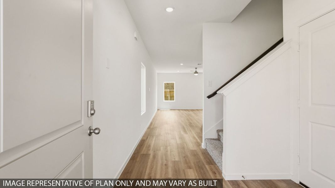 Spacious, unfurnished interior of a new home in Sunterra, Katy (Image 13).