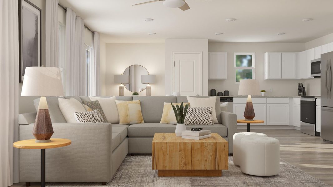 A living room with a couch and a coffee table. A living room with a couch and a coffee table.