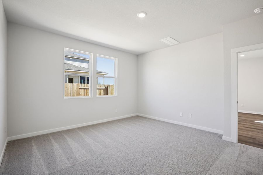 A room with a window and a door. A room with a window and a door.