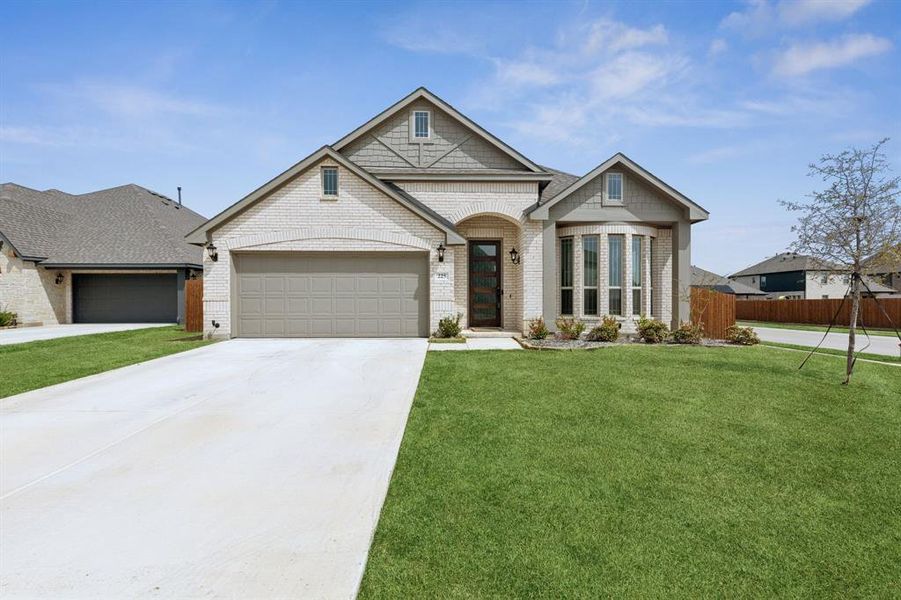 Front exterior of a new home in , Ponder, TX, highlighting curb appeal (Image 2). Front exterior of a new home in , Ponder, TX, highlighting curb appeal (Image 2).