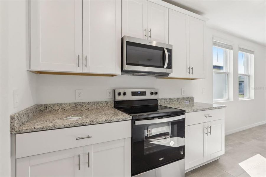 Furnished interior view inside a new home in Springs at Lake Alfred - Signature Series, Lake Alfred (Image 6).