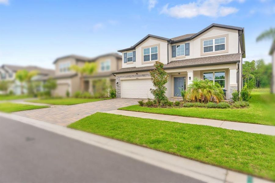 Front exterior of a new home in , Tampa, FL, highlighting curb appeal (Image 31).