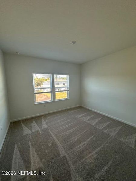 Spacious, unfurnished interior of a new home in Brook Forest, St. Augustine (Image 16).