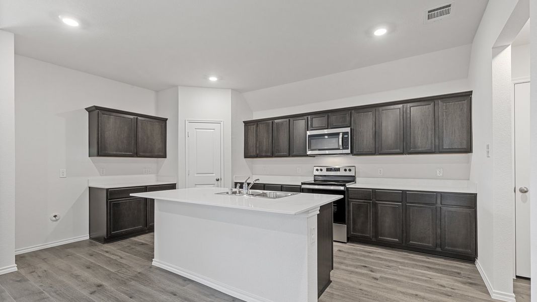 Furnished interior view inside a new home in Windrose, Pilot Point (Image 3).