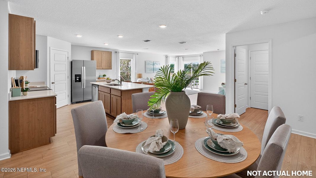 Furnished interior view inside a new home in Sawmill Branch, Palm Coast (Image 7).