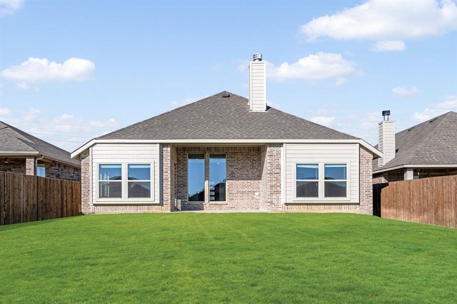 Exterior details and patio area of a home in Godley Ranch Classic, Godley (Image 20).