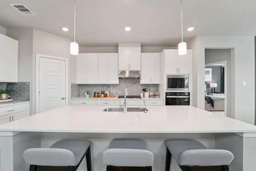 Photo is not of the actual home, but is an inspirational photo of builder’s model home and may depict options, furnishings, and/or decorator features that are not included Photo is not of the actual home, but is an inspirational photo of builder’s model home and may depict options, furnishings, and/or decorator features that are not included