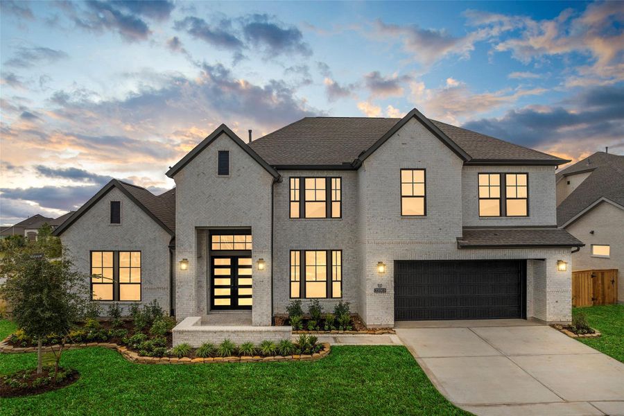 Front exterior of a new home in Bridgeland 70′, Cypress, TX, highlighting curb appeal (Image 2). Front exterior of a new home in Bridgeland 70′, Cypress, TX, highlighting curb appeal (Image 2).