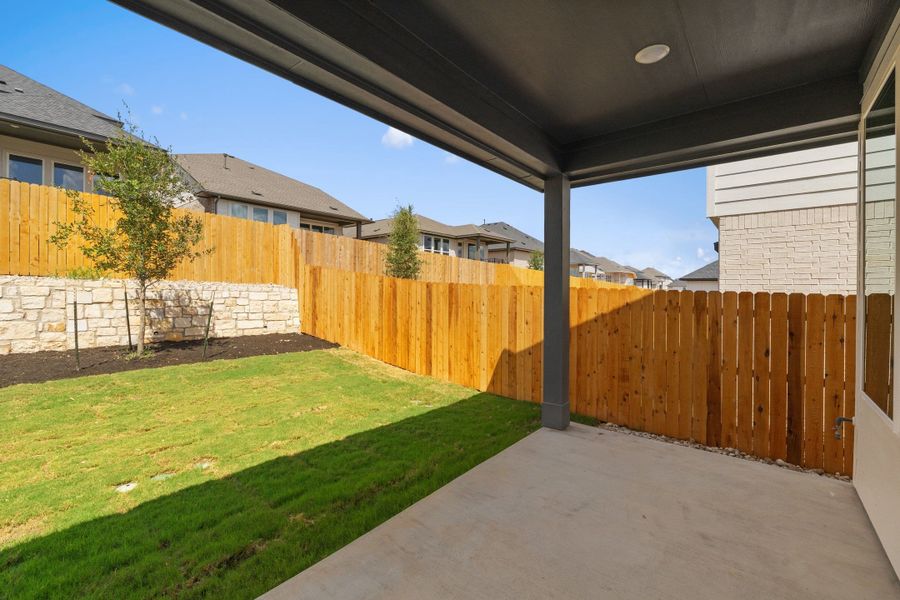Exterior details and patio area of a home in Heritage, Dripping Springs (Image 4).