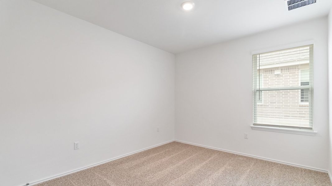 Representative unfurnished interior of a home built from the The Juniper by D.R. Horton in Palomino, Manor (Image 21).