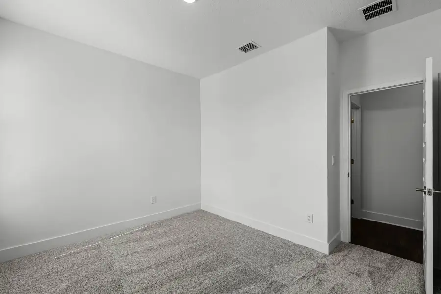 Representative unfurnished interior of a home built from the Newton by Rockwell Homes in Harvest at Ovation - Townhomes, Winter Garden (Image 91). Representative unfurnished interior of a home built from the Newton by Rockwell Homes in Harvest at Ovation - Townhomes, Winter Garden (Image 91).