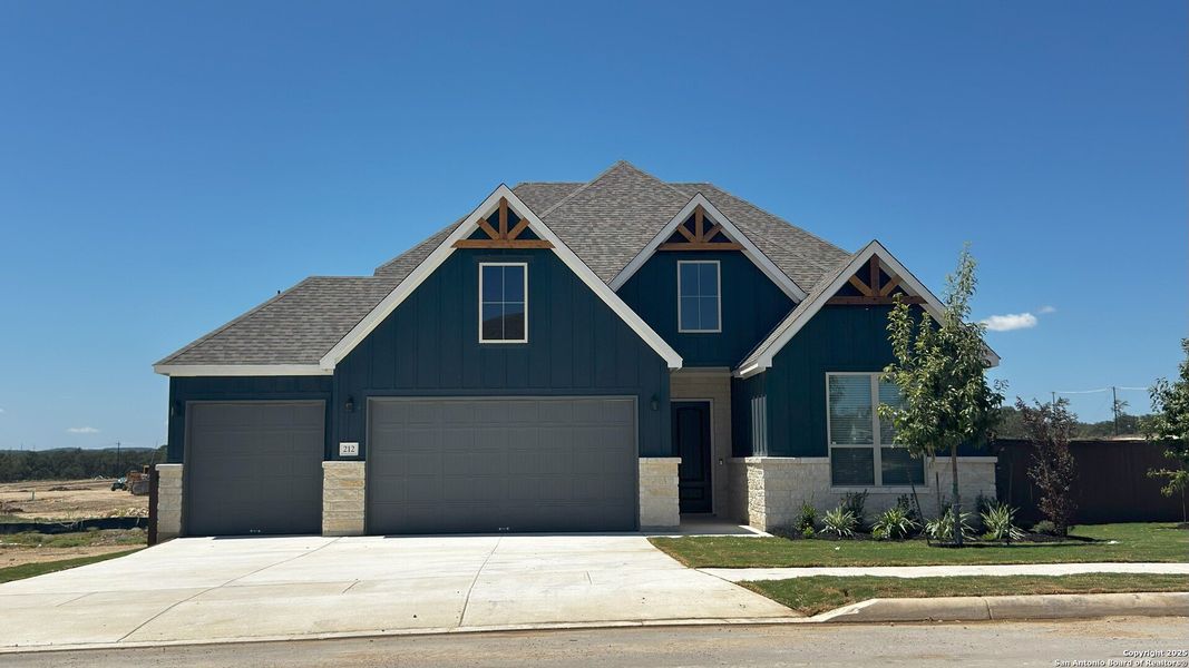 Front exterior of a new home in Corley Farms, Boerne, TX, highlighting curb appeal (Image 1). Front exterior of a new home in Corley Farms, Boerne, TX, highlighting curb appeal (Image 1).
