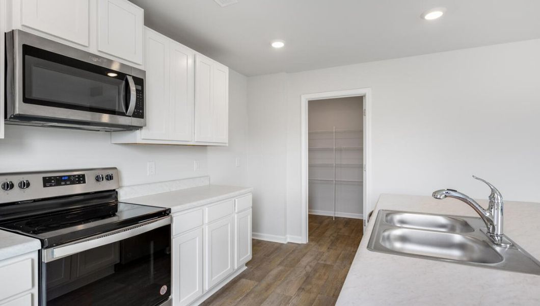Furnished interior view inside a new home in Driftwood, Richlands (Image 7).