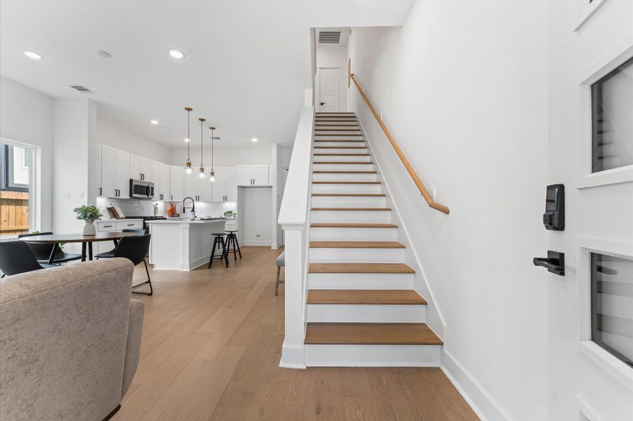 Welcome home! his beautifully crafted 2-story home by Disama Building Group features a thoughtfully designed open-concept layout on the first floor, seamlessly connecting the living, dining, and kitchen areas.