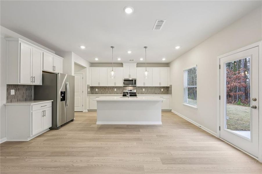 Furnished interior view inside a new home in Parkside at Grayson, Grayson (Image 8).