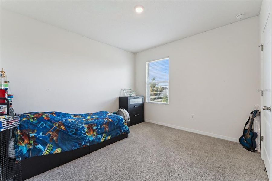 Furnished interior view inside a new home in Kindred, Kissimmee (Image 22).