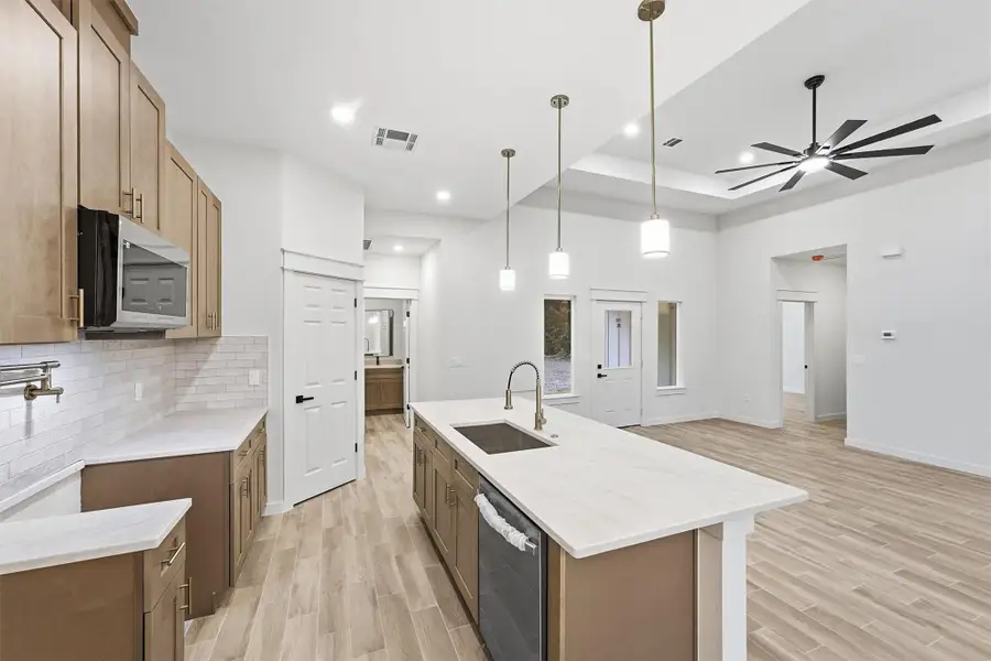 Furnished interior view inside a new home in , Conroe (Image 7).
