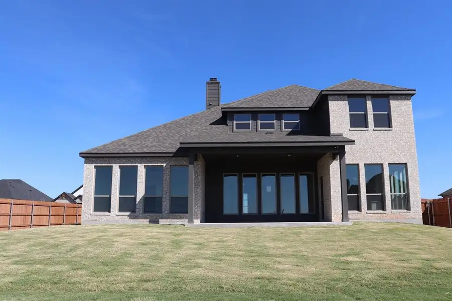 Exterior details and patio area of a home in Bull Hide Estates, Hewitt (Image 3). Exterior details and patio area of a home in Bull Hide Estates, Hewitt (Image 3).