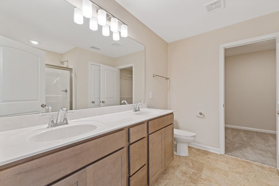 Representative photos of the same floor plan. Actual home will feature different colors and finishes. Representative photos of the same floor plan. Actual home will feature different colors and finishes.