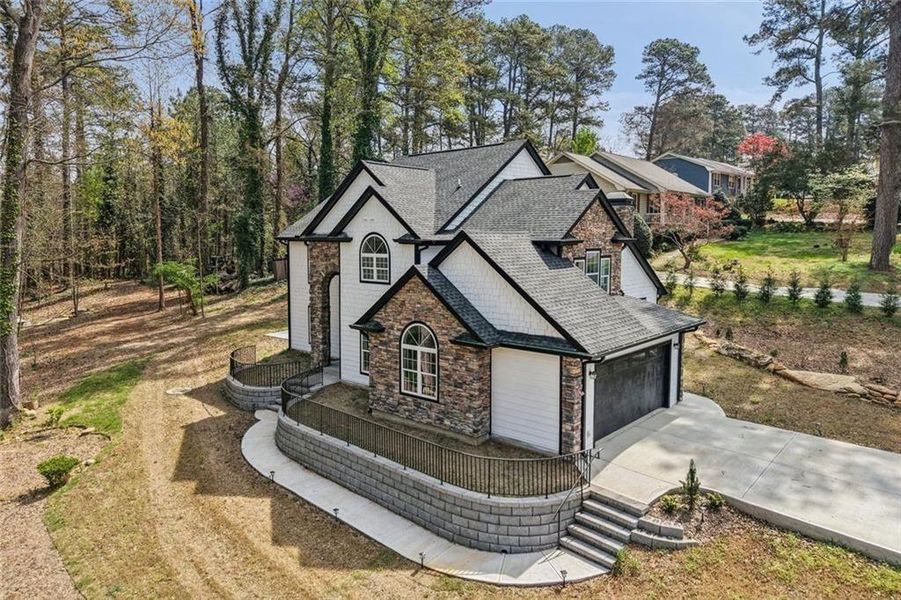Front exterior of a new home in , Grayson, GA, highlighting curb appeal (Image 29).