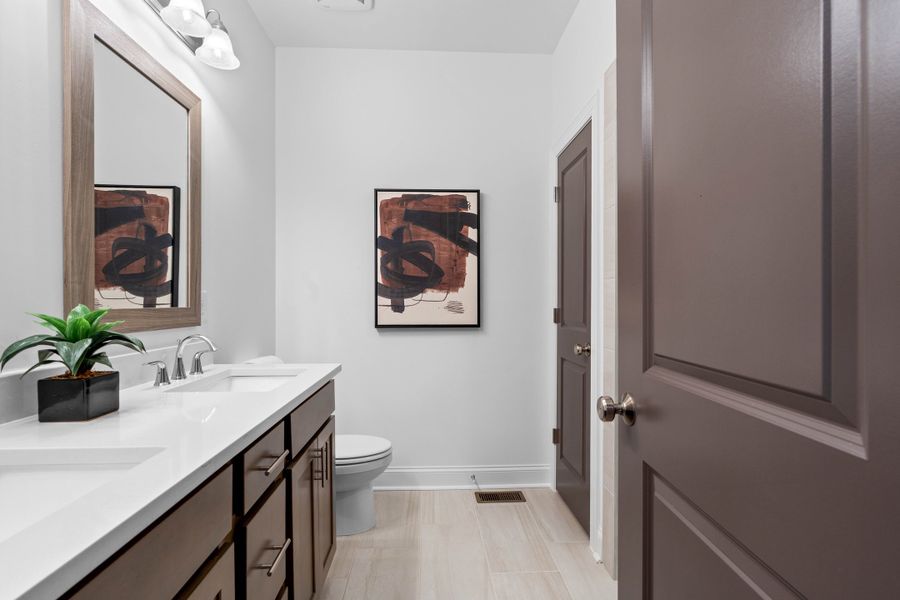 Representative furnished interior of a home built from the The Oleander by The Providence Group in Market Square at Sawnee Village, Cumming (Image 30).