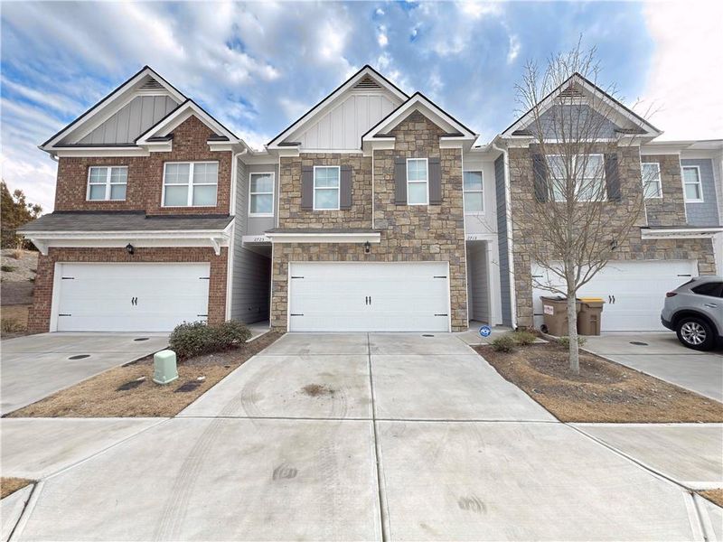 Front exterior of a new home in , Buford, GA, highlighting curb appeal (Image 14).