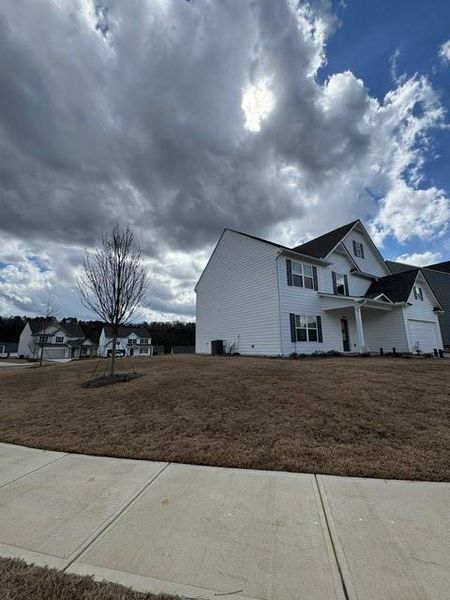 Front exterior of a new home in , Canton, GA, highlighting curb appeal (Image 11). Front exterior of a new home in , Canton, GA, highlighting curb appeal (Image 11).